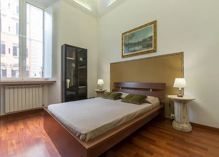 Guesthost - Piazza Vittorio Exclusive Apartment Rom